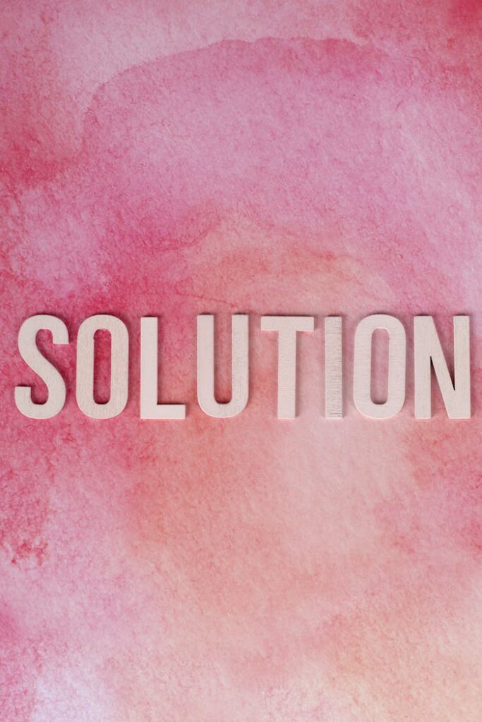 The Art of Drawing Readers In: Your attractive post title goes here Inspirational 'Solution' text on a vibrant pink watercolor background for motivation and problem-solving concepts.